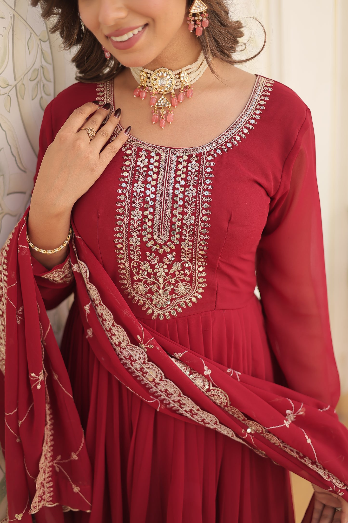 maroon embroidered gown