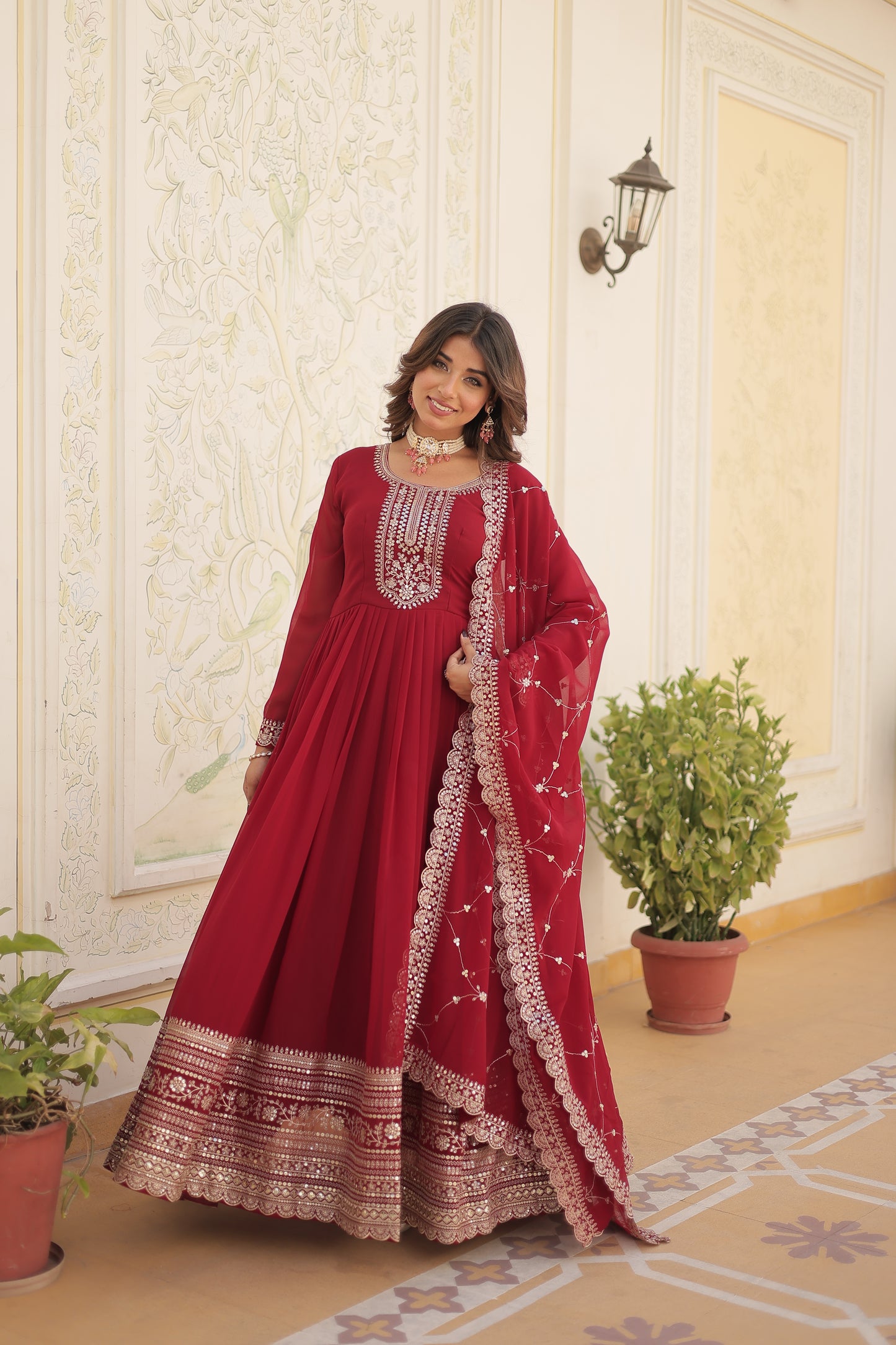 maroon embroidered gown
