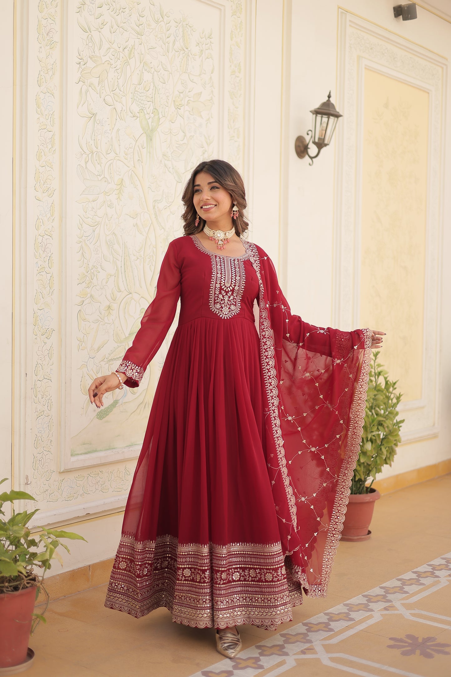 maroon embroidered gown