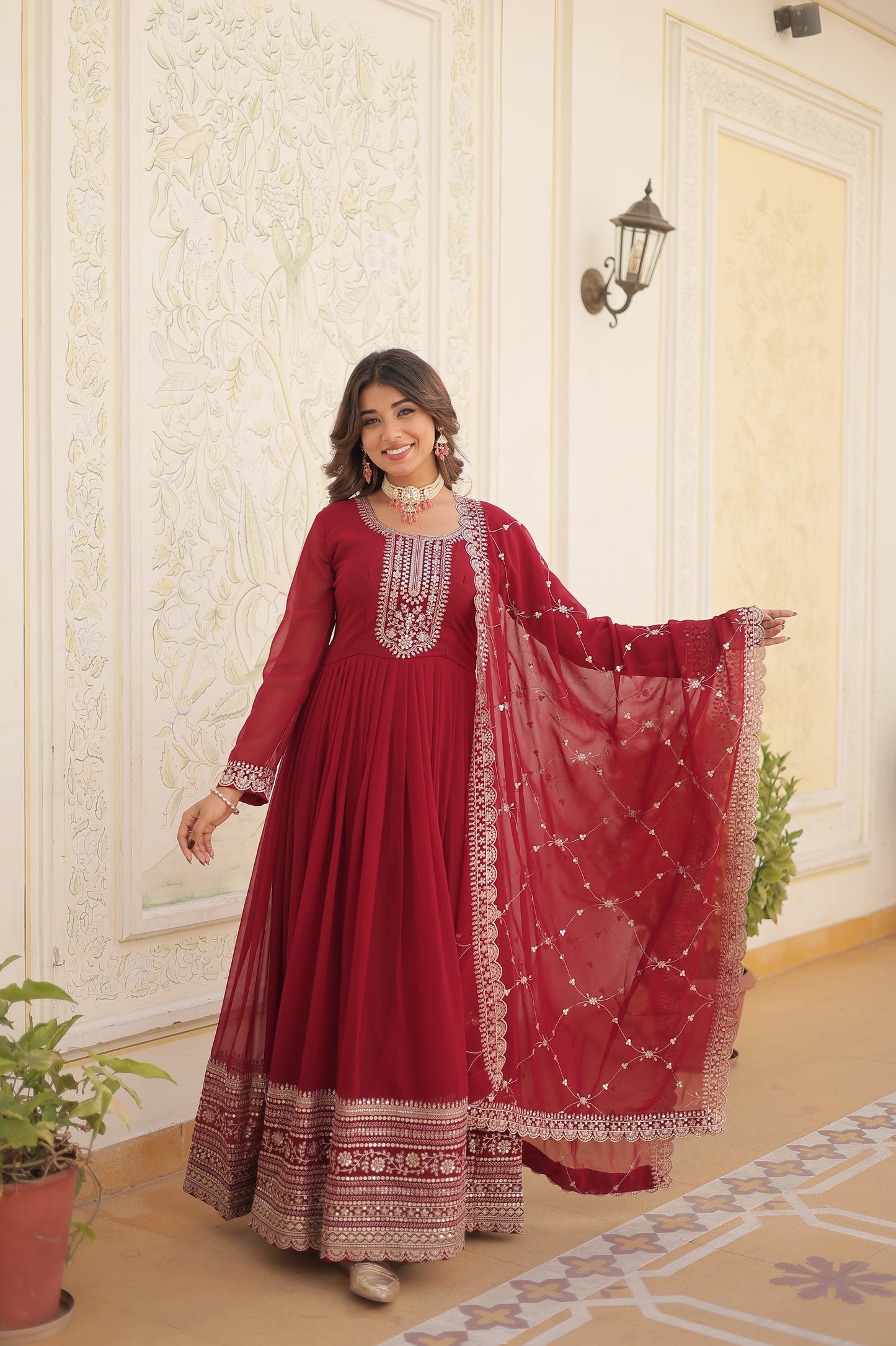maroon embroidered gown