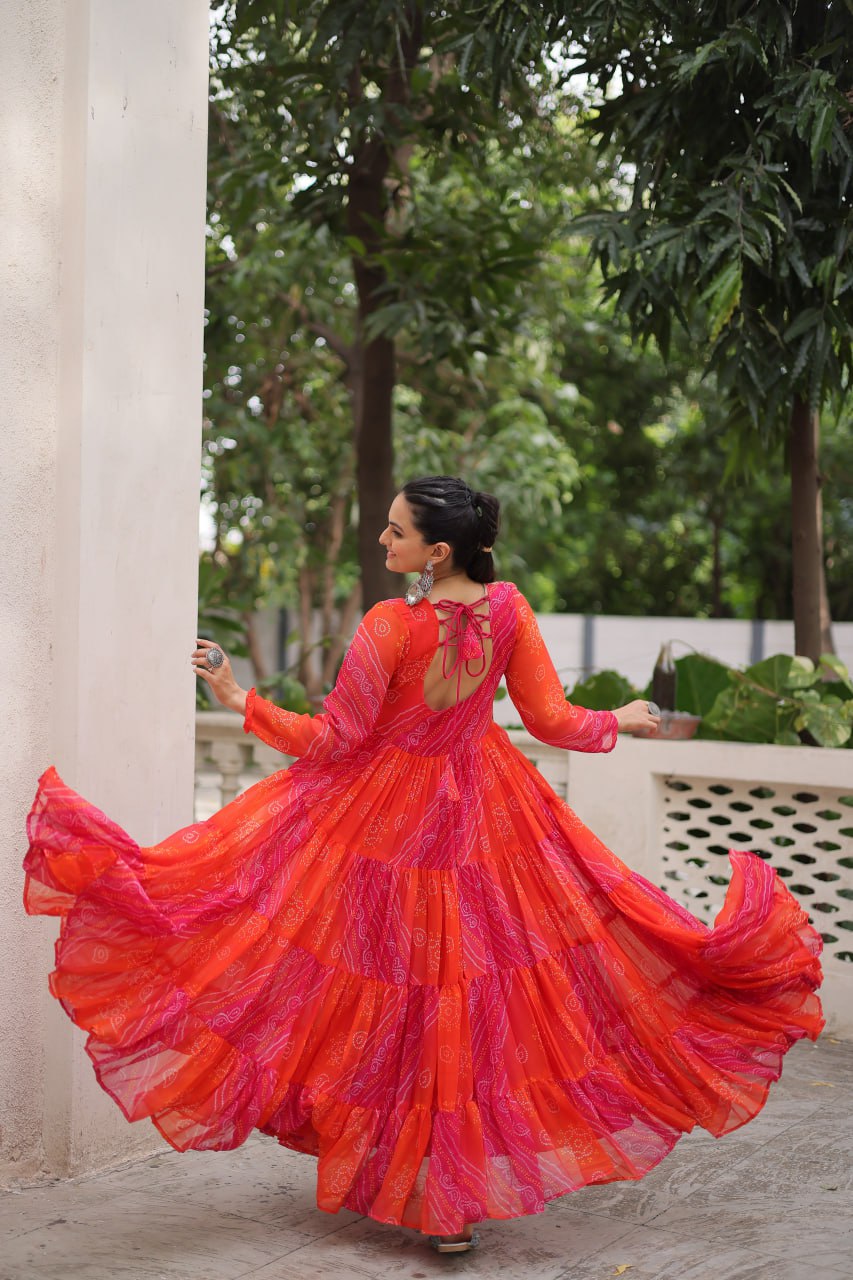 pink and red Laheriya and bandhej print with katchi patch work faux georgette