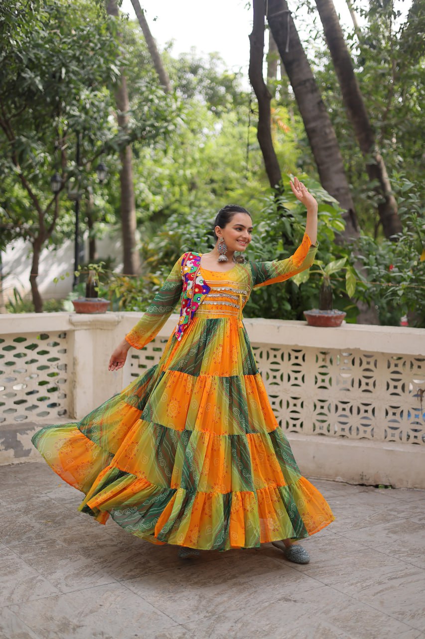 Yellow and green faux georgette Laheriya and bandhej print with katchi patch work gown