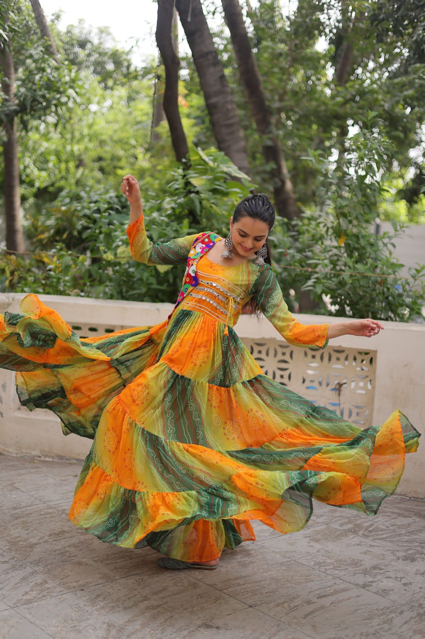 Yellow and green faux georgette Laheriya and bandhej print with katchi patch work gown