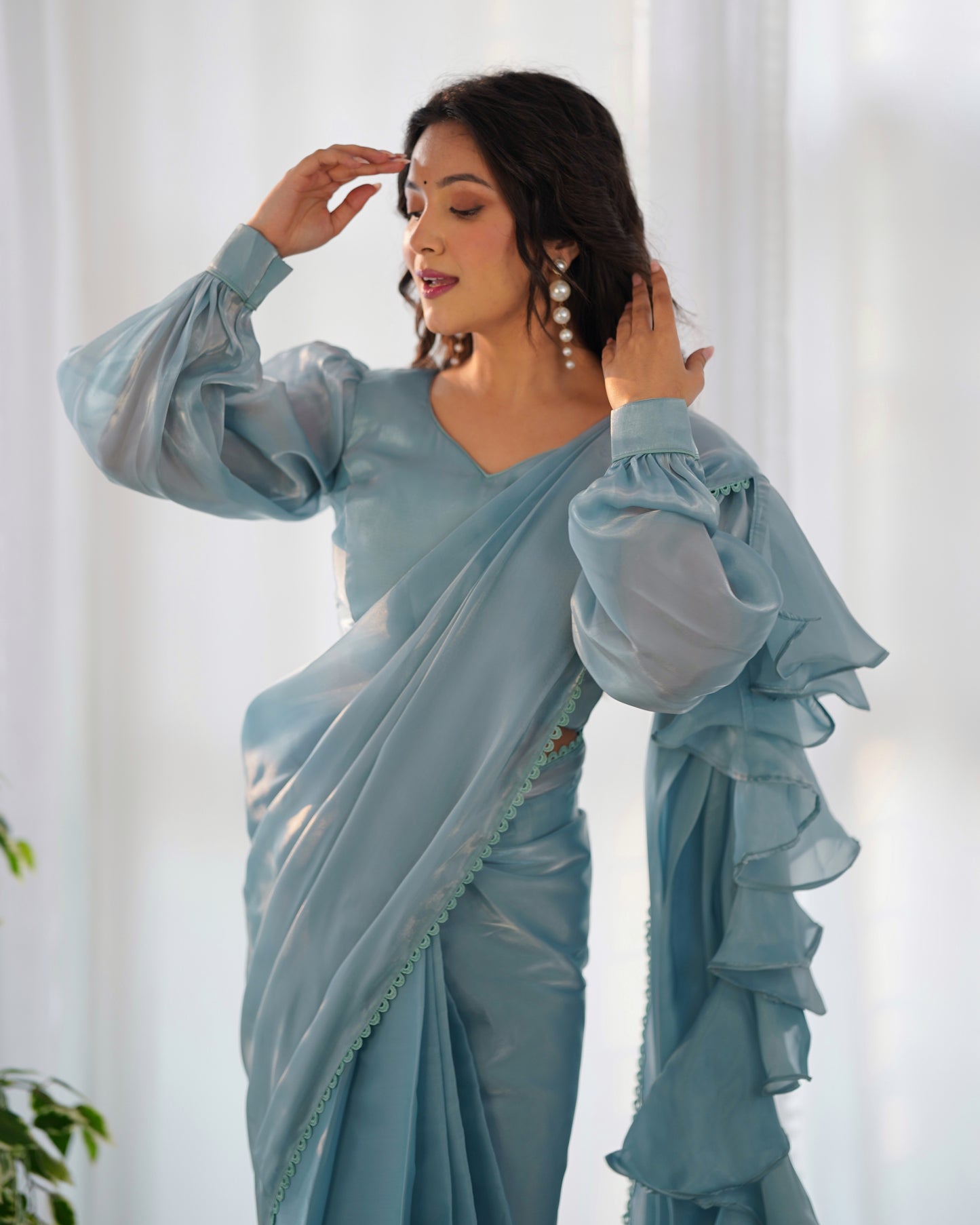 teal blue ruffle saree