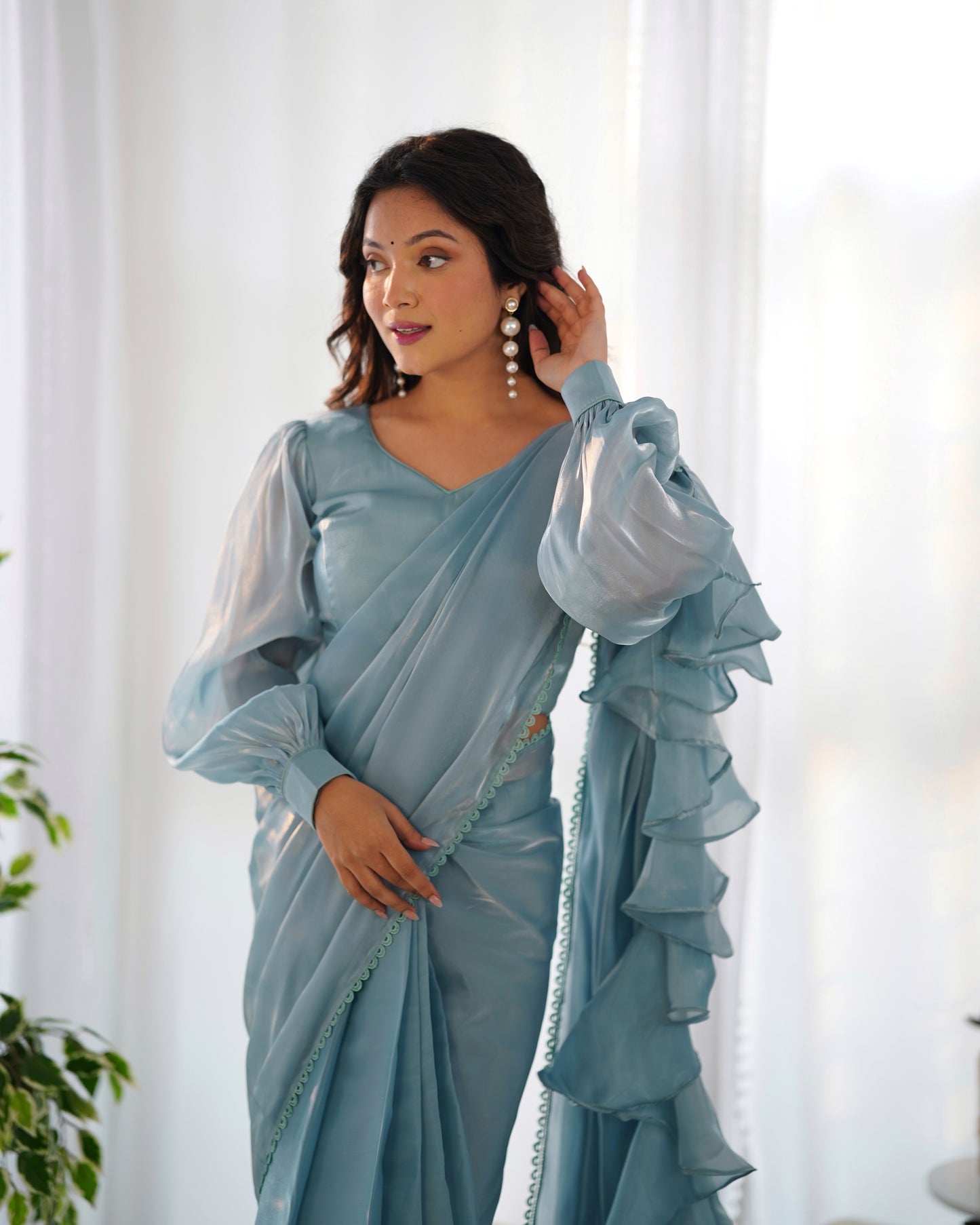 teal blue ruffle saree
