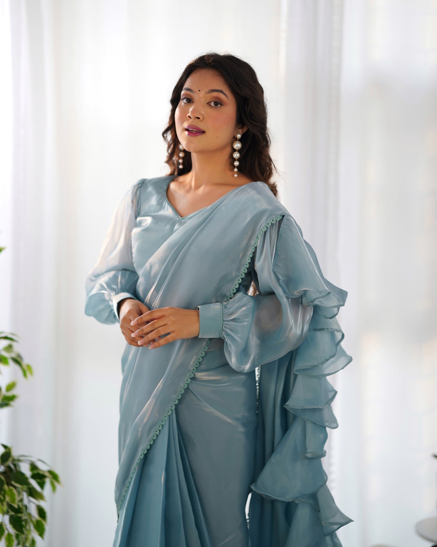 teal blue ruffle saree