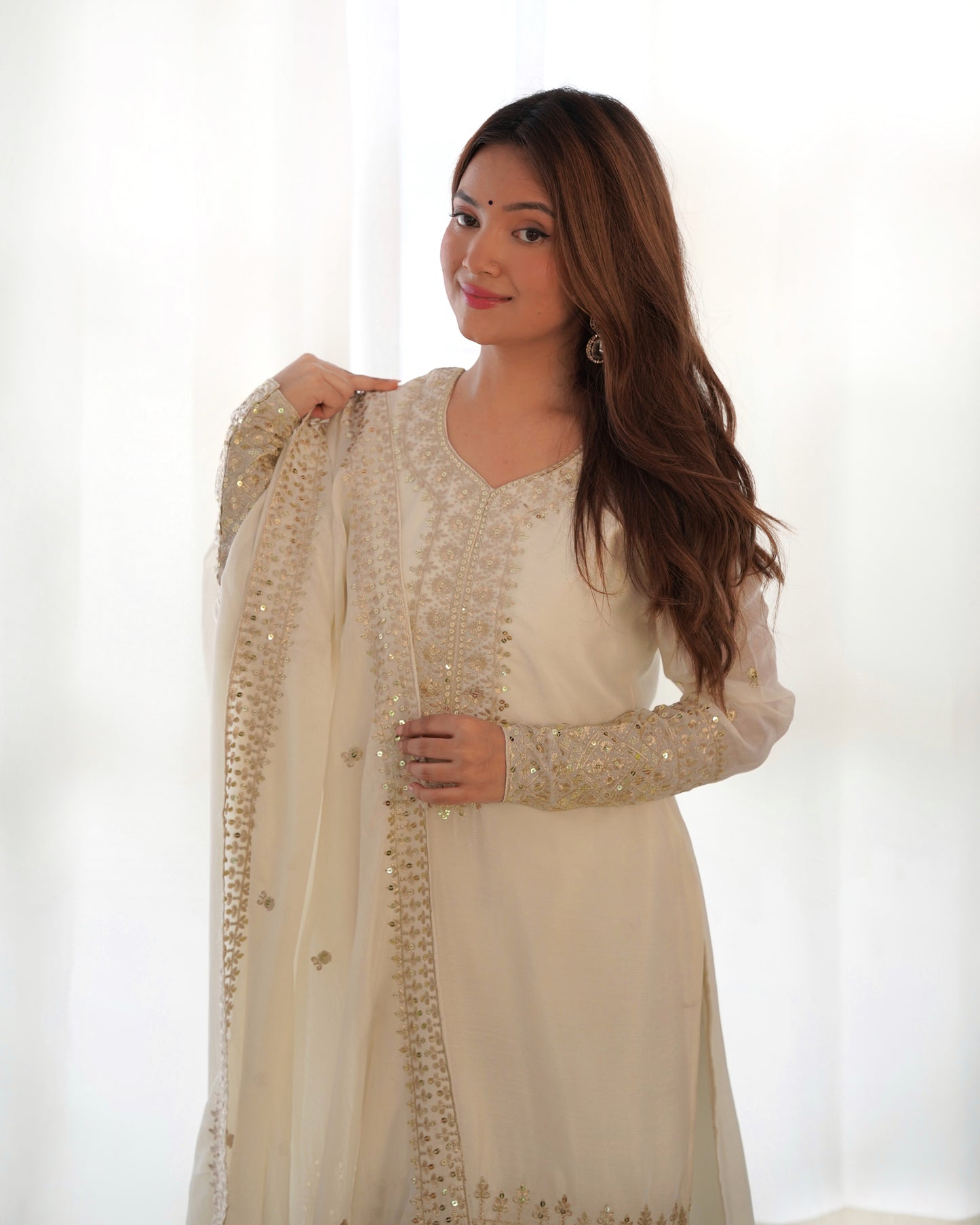 white embroidered kurta set