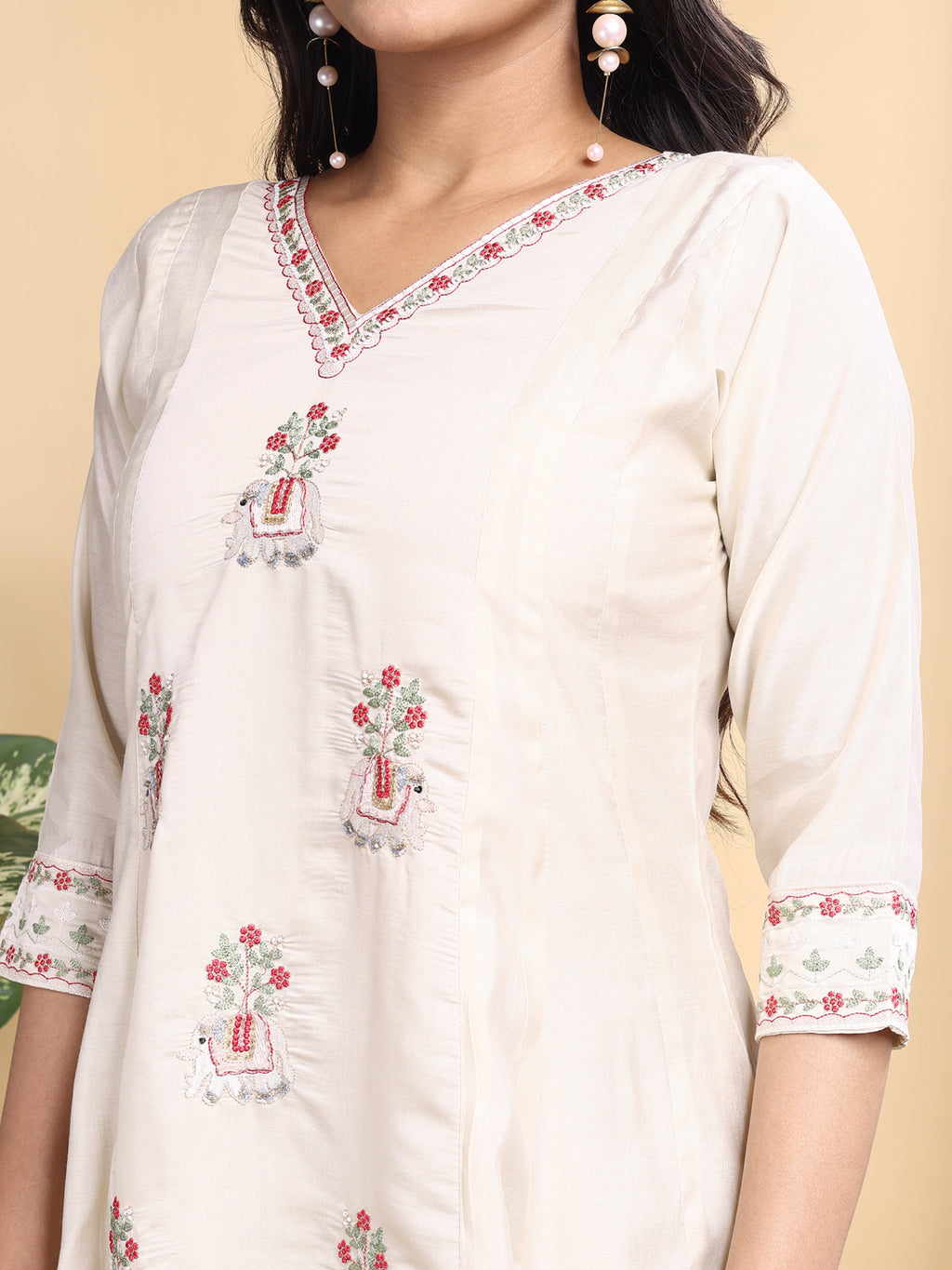 cream silk embroidery with hand work kurta set
