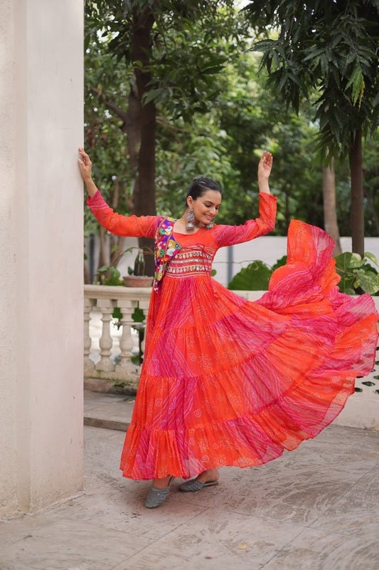 pink and red Laheriya and bandhej print with katchi patch work faux georgette