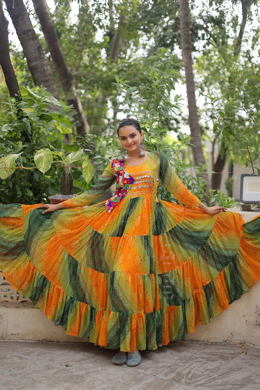 Yellow and green faux georgette Laheriya and bandhej print with katchi patch work gown