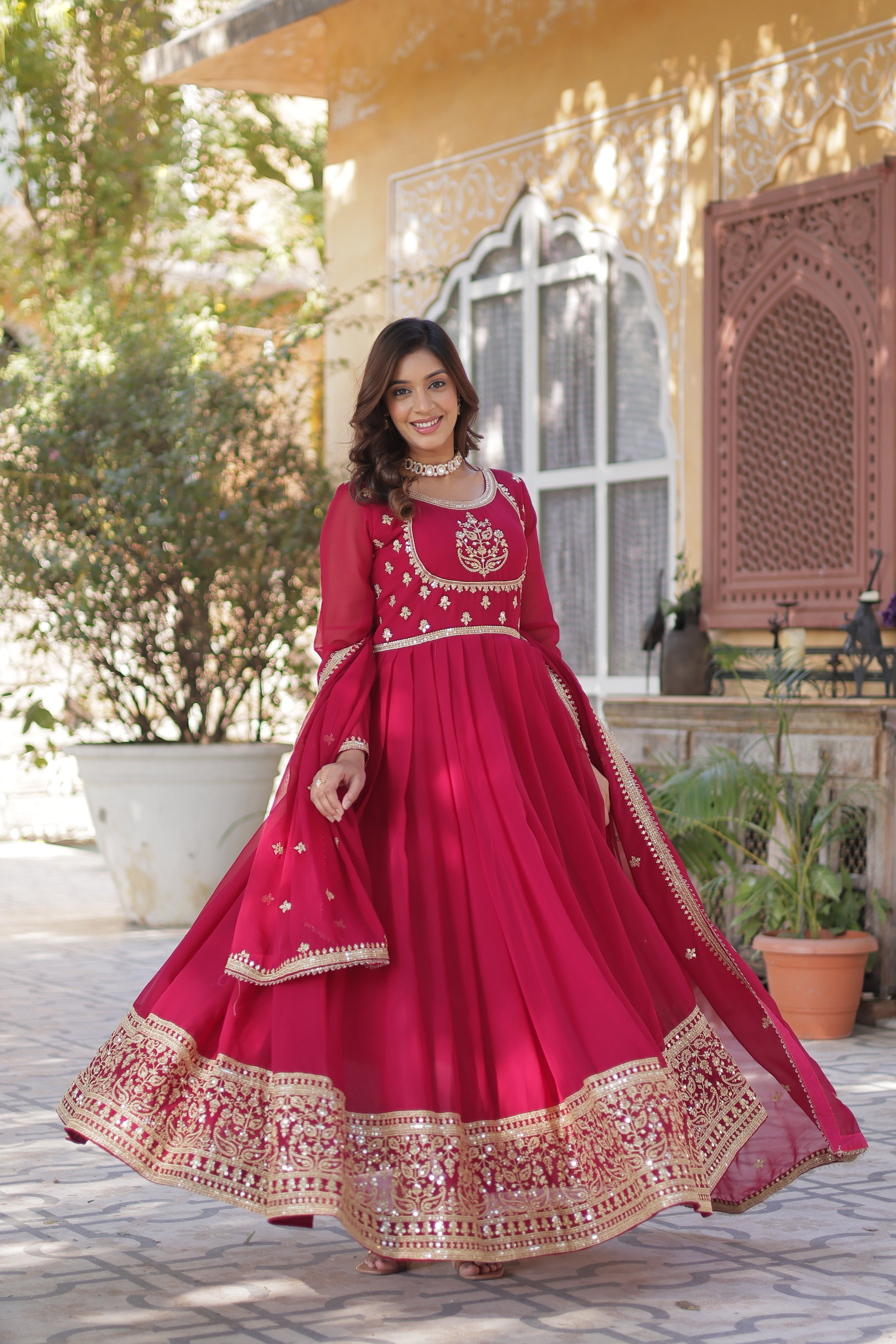 pink embroidered work gown 