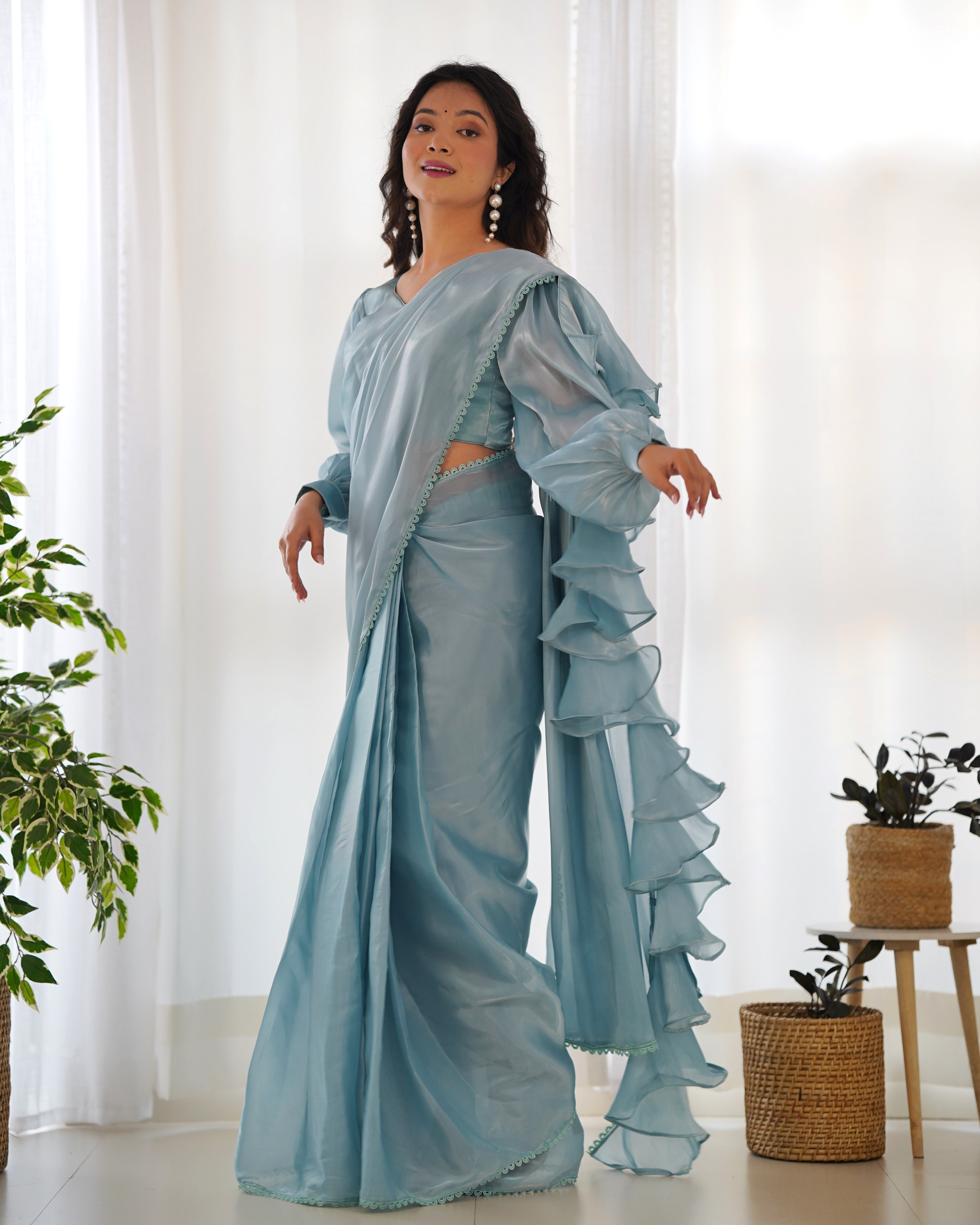 teal blue ruffle saree 
