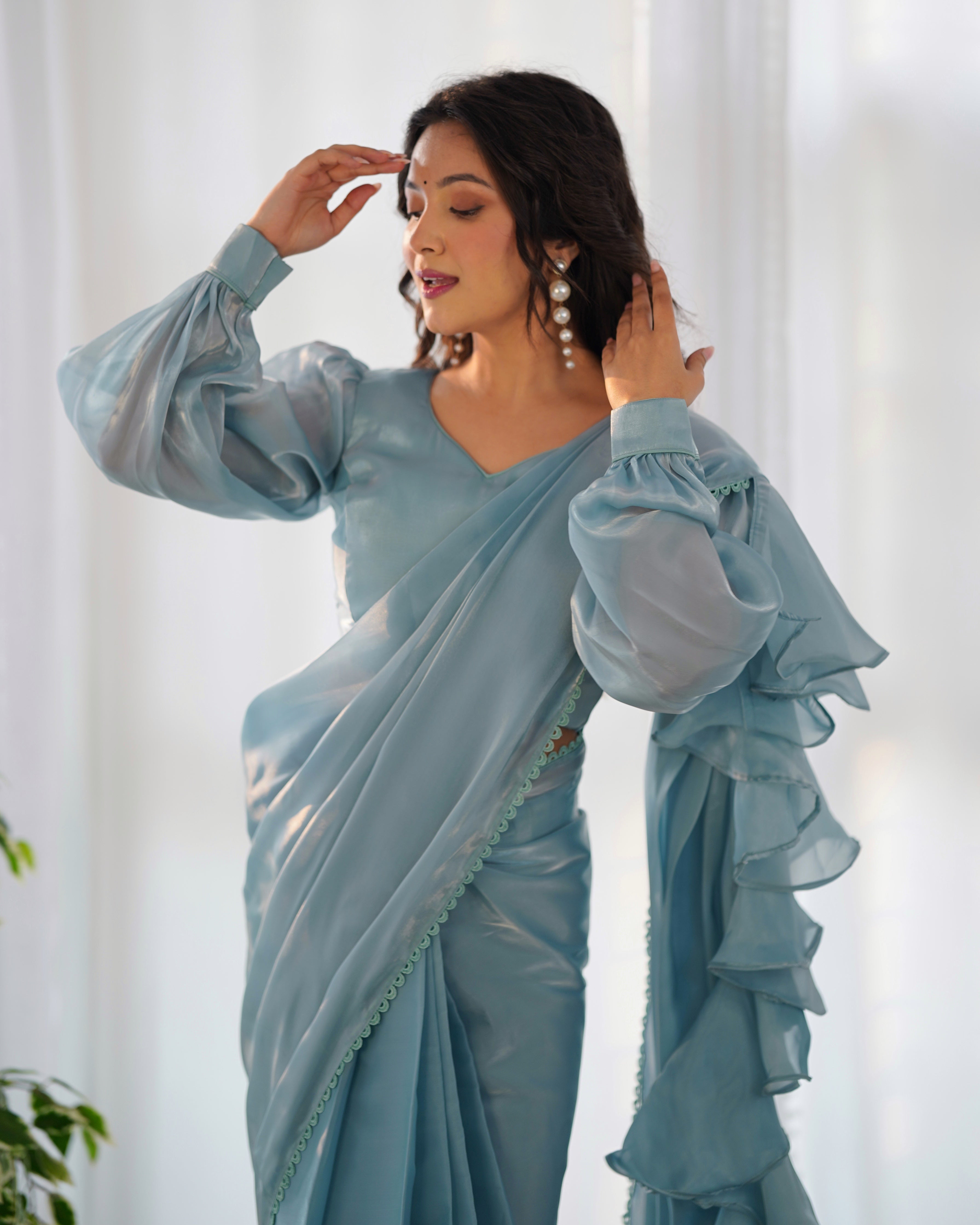 teal blue ruffle saree 