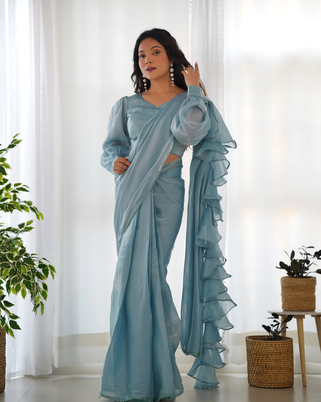 teal blue ruffle saree main