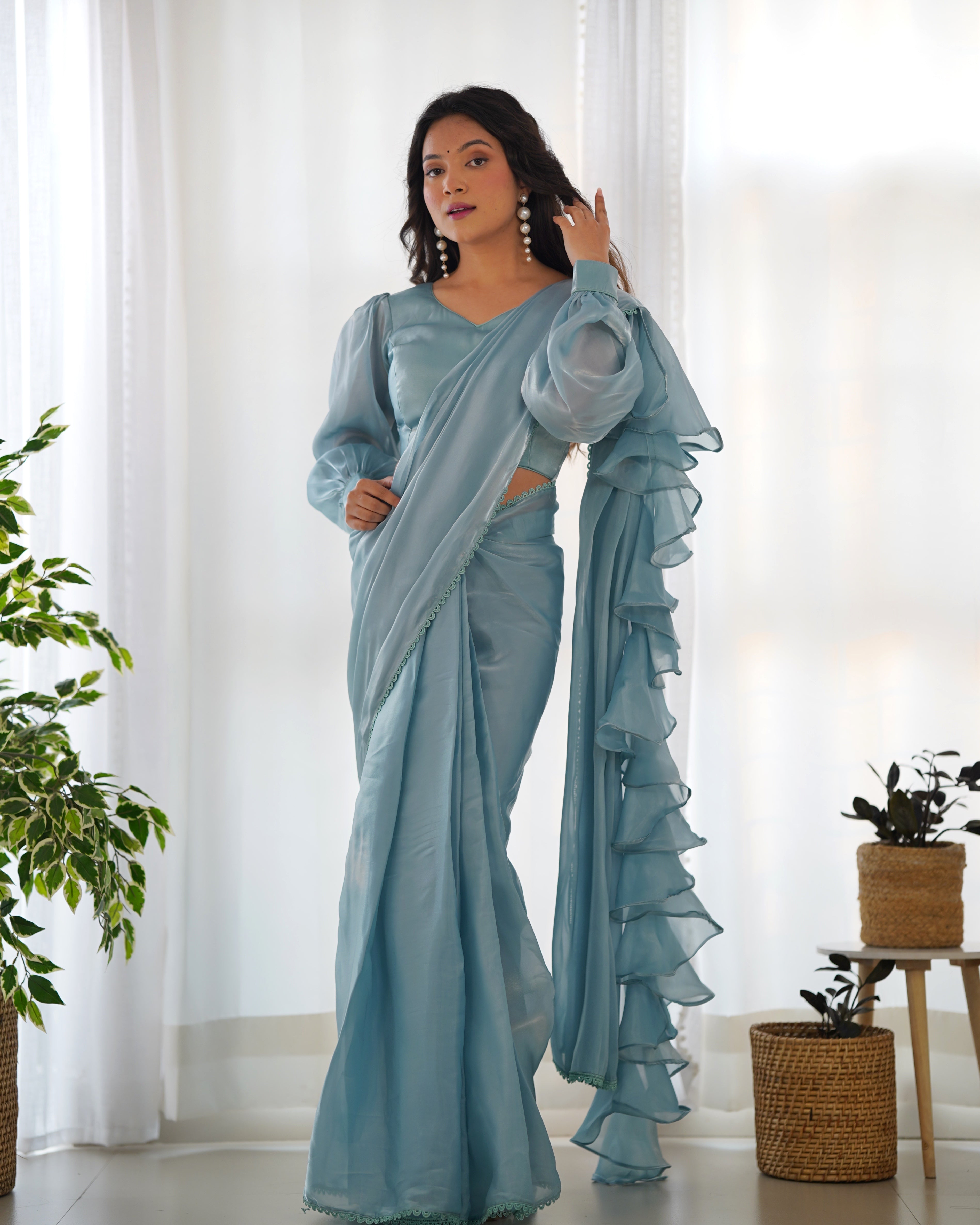 teal blue ruffle saree main